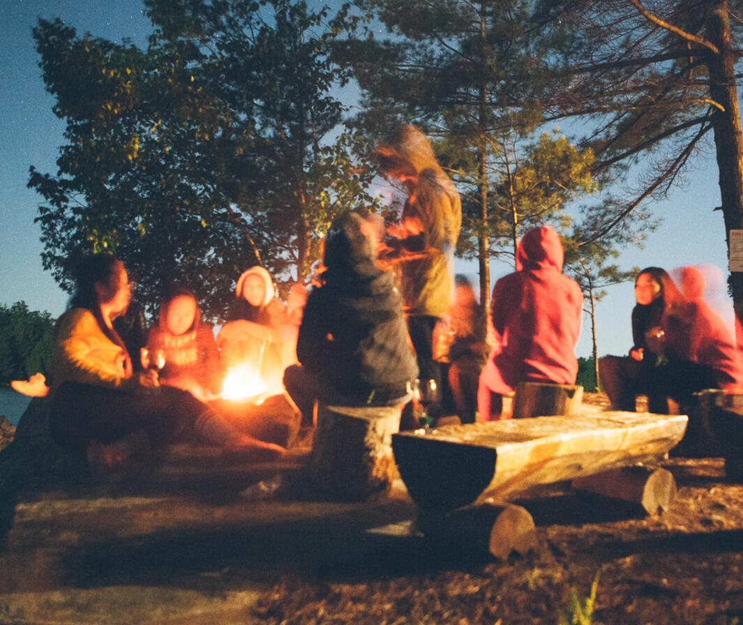 New friends gathering around the fire